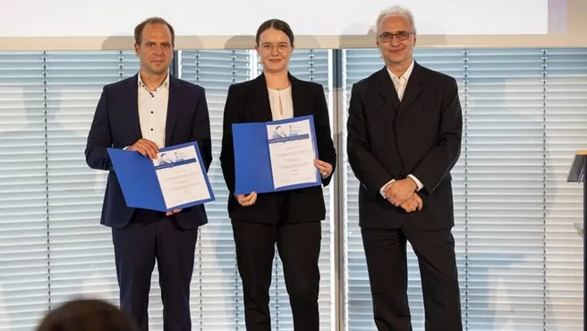 Gabriela Zeller and Matthias Scherer at the award ceremony of the GAUSS Prize 2022